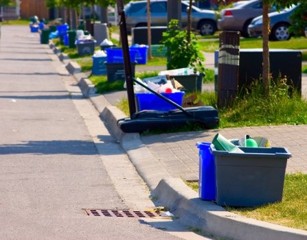 Image of operatives handling green waste responsibly